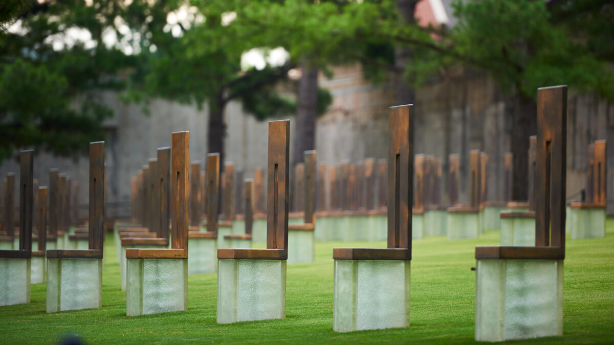 Each chair in the Field of Empty Chairs represents and memorializes a person killed in the Oklahoma City bombing.