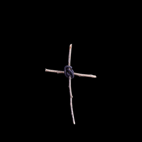 Handmade Cross Using Two Sticks and a Hair Tie