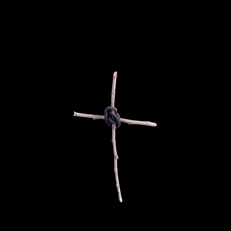 Handmade Cross Using Two Sticks and a Hair Tie